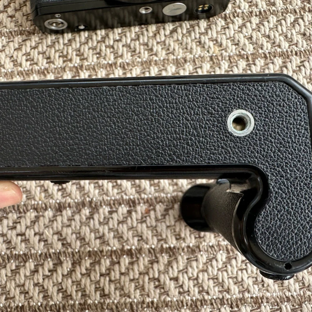 Nikon FE film camera with MD12 attachment grip
